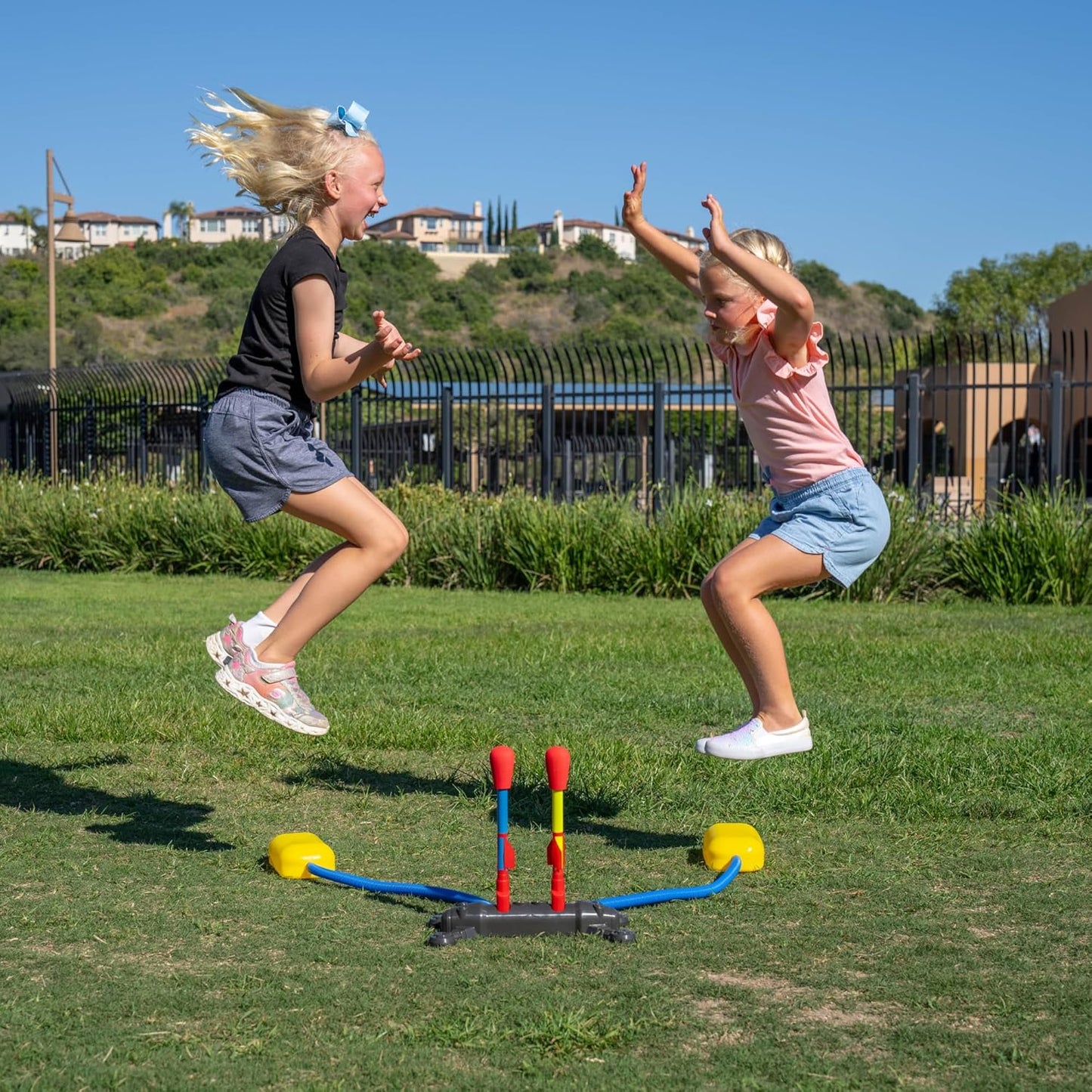 Stomp Rocket Original Dueling Rocket Launcher for Kids, 8 Rockets - Fun Backyard & Outdoor Kids Toys Gifts for Boys & Girls -Toy Foam Blaster Set Soars 200ft - Multi-Player Launcher Stand